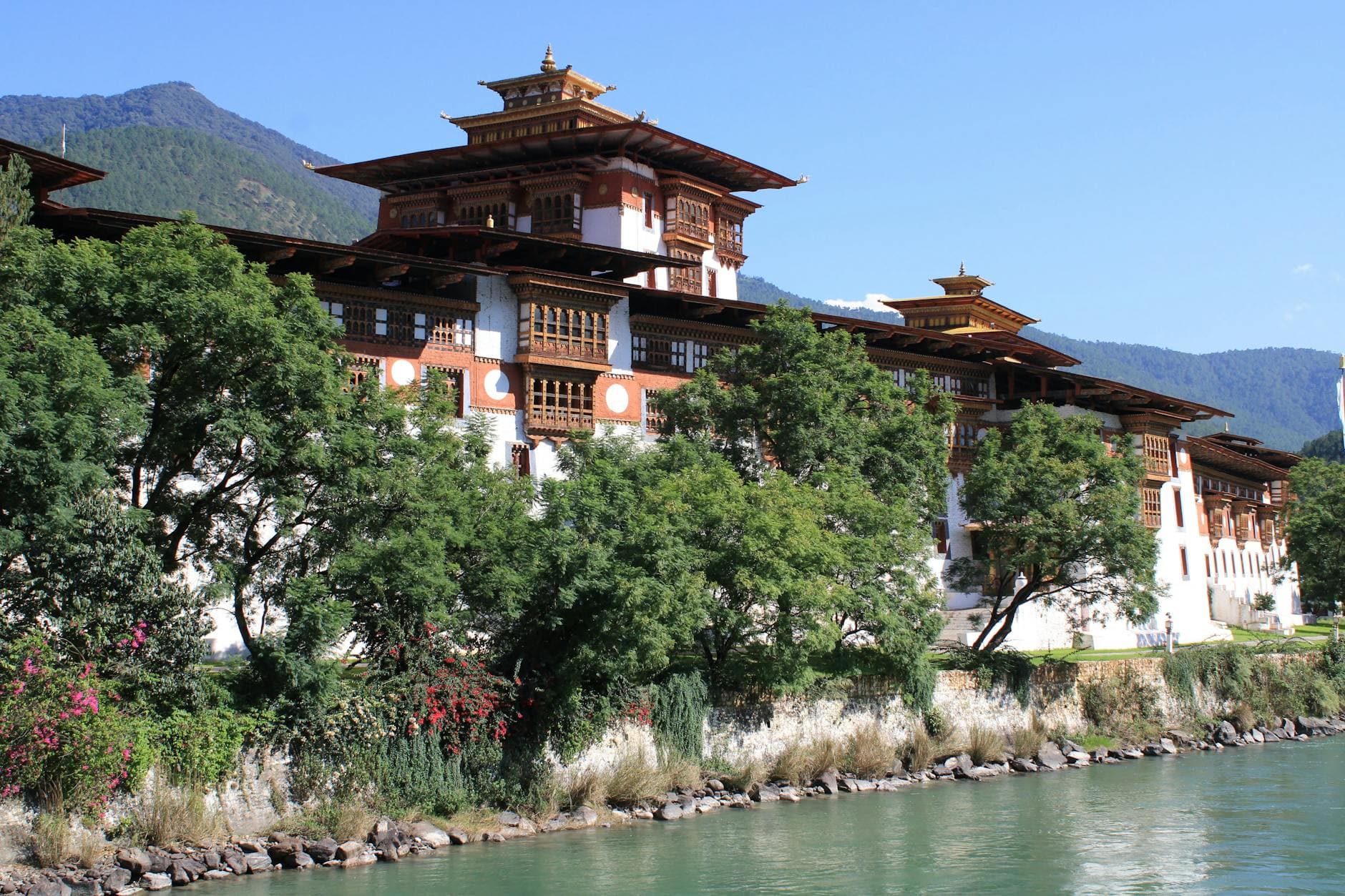 Bhutan dzong fortress by a river valley